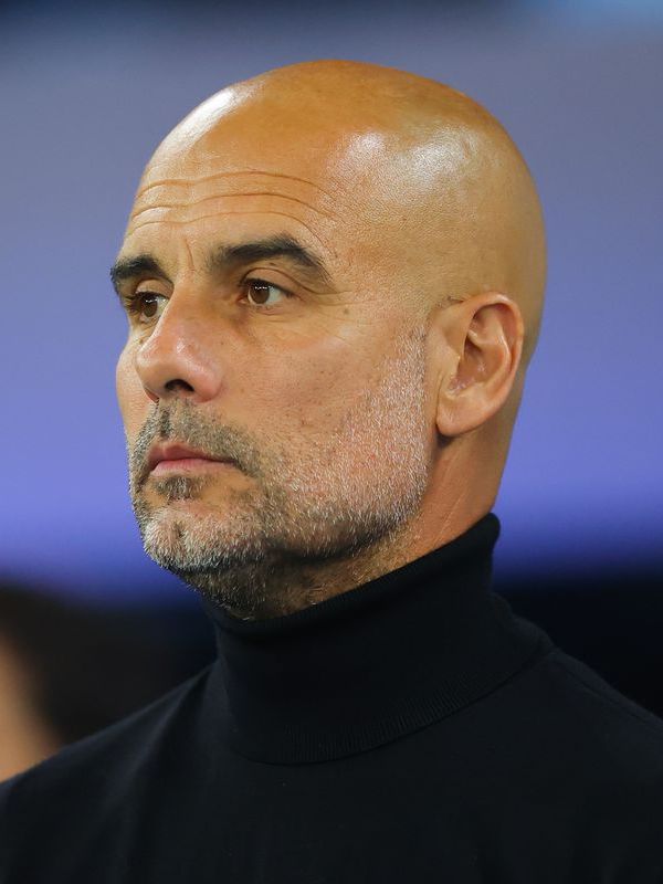 pep guardiola bald with beard